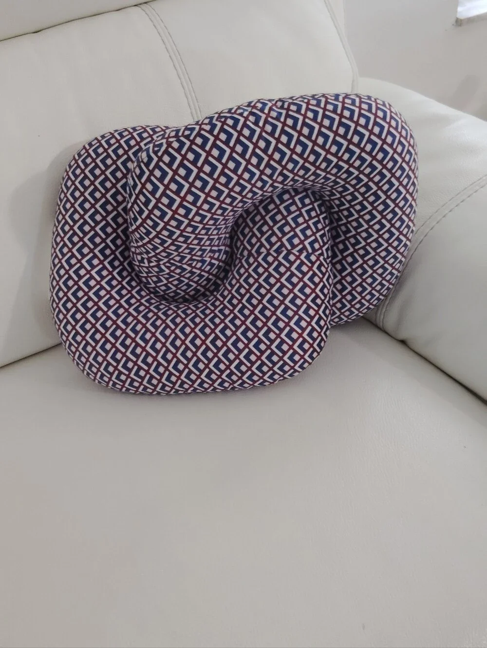 Modern Knot Throw Pillow in Navy and Red Geometric Weave